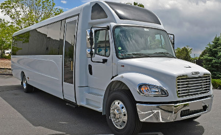 a Houston Aambassador Charter Bus minibus shuttle
